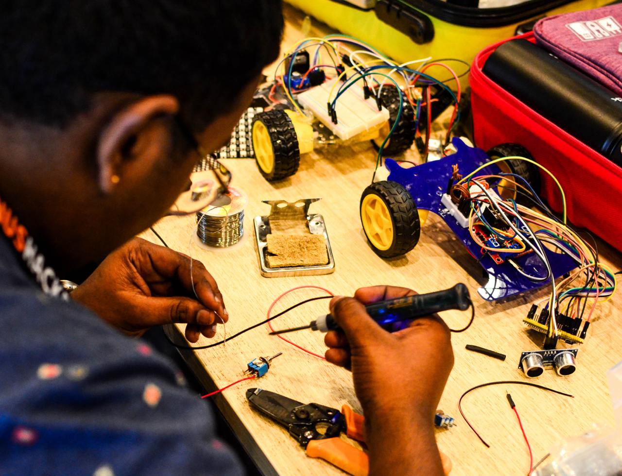 Participant working on electronics